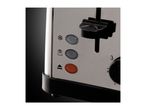 Close-up of a toaster with control buttons and a browning dial.