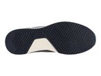 Bottom view of a dark blue and beige athletic shoe sole with a textured grip pattern.