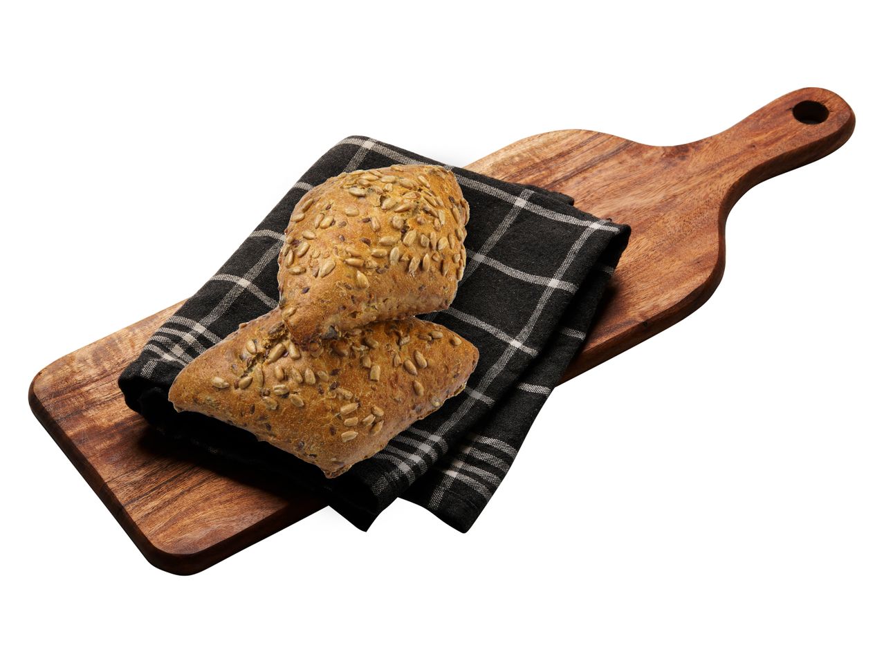 Solrosfröbullar på en träbricka.