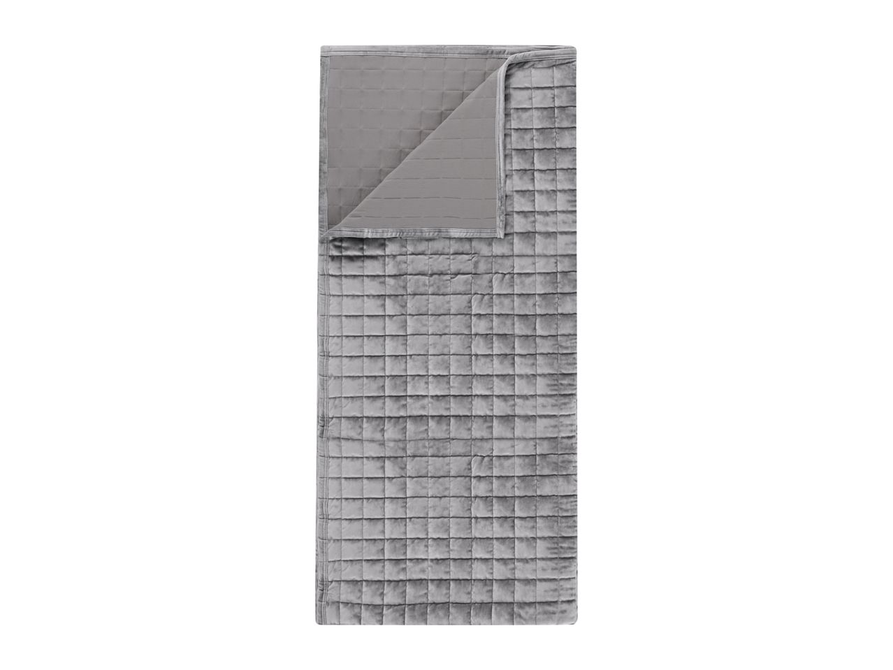 Grey quilted weighted blanket with a soft velvet cover