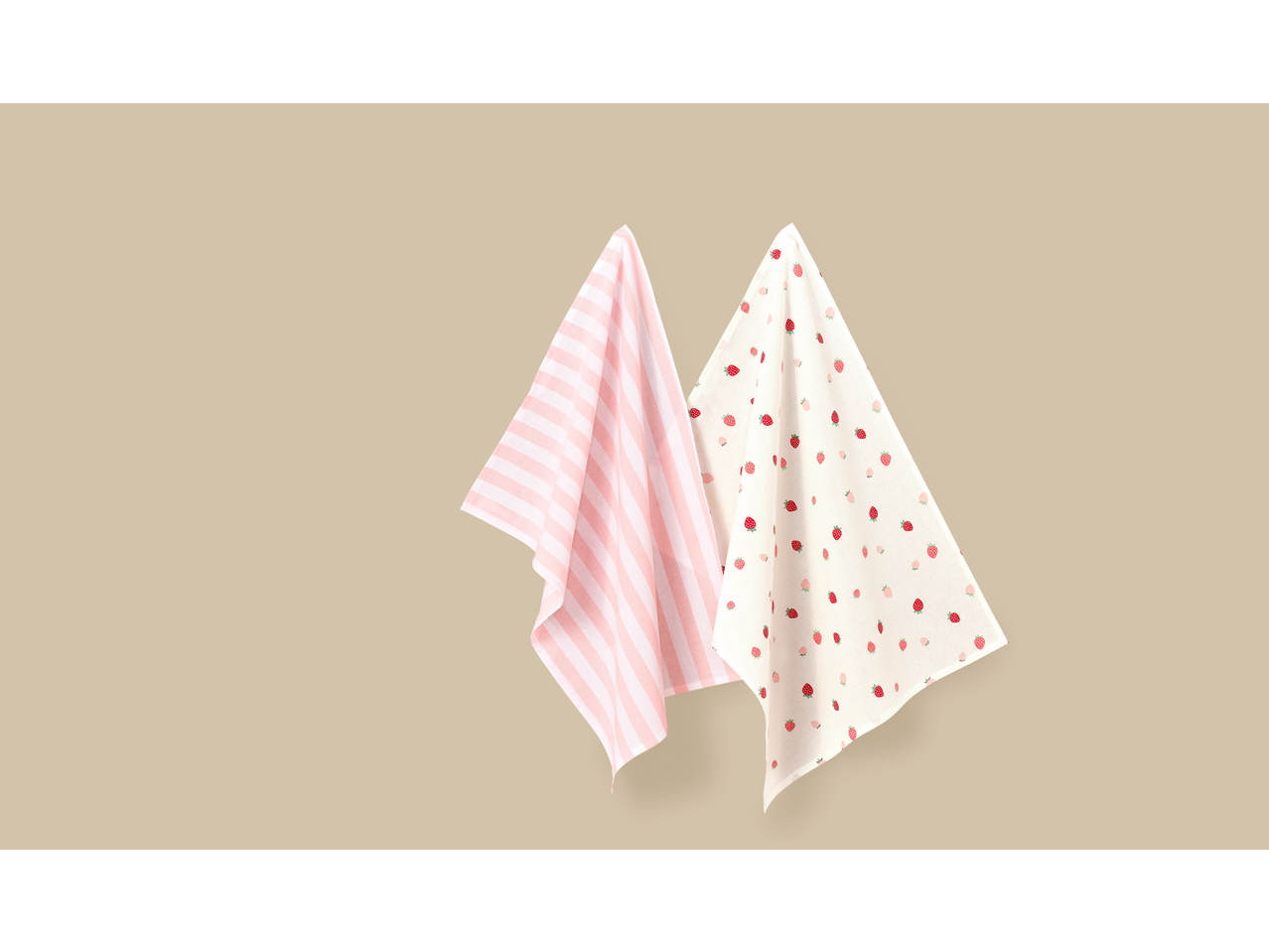 Dve kuhinjske krpe, jedna sa ružičastim prugama i jedna sa dezenom jagoda.