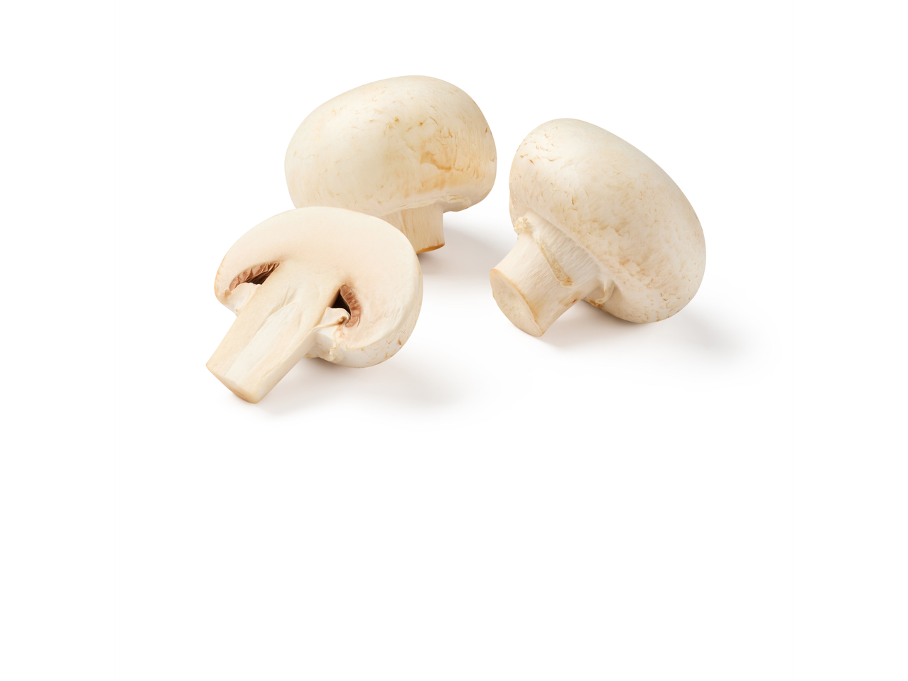 Farrell's Irish Mushrooms: Three fresh white mushrooms, one sliced in half.