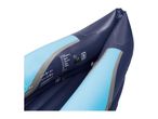 Close-up of an inflatable kayak with inflation valves and a measurement strip.