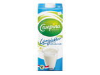 Een pak halfvolle melk met een glas melk en bloemen.
