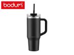 Black insulated travel mug with a handle and straw, on a white background.