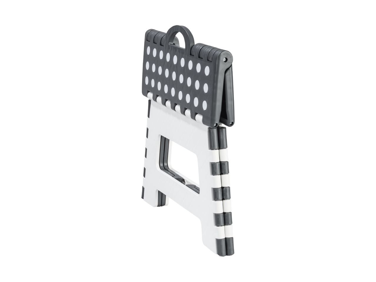 A folded, polka-dotted plastic step stool.