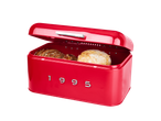 A red SILVERCREST® bread bin with a partially open lid, containing two loaves of bread.
