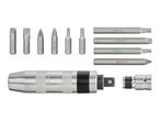Impact driver set with various screwdriver bits and a socket adapter.