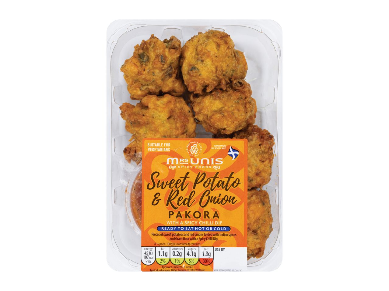Sweet potato and red onion pakora with a spicy chilli dip, suitable for vegetarians.