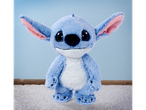 A cute blue Stitch plush toy on a white carpet.