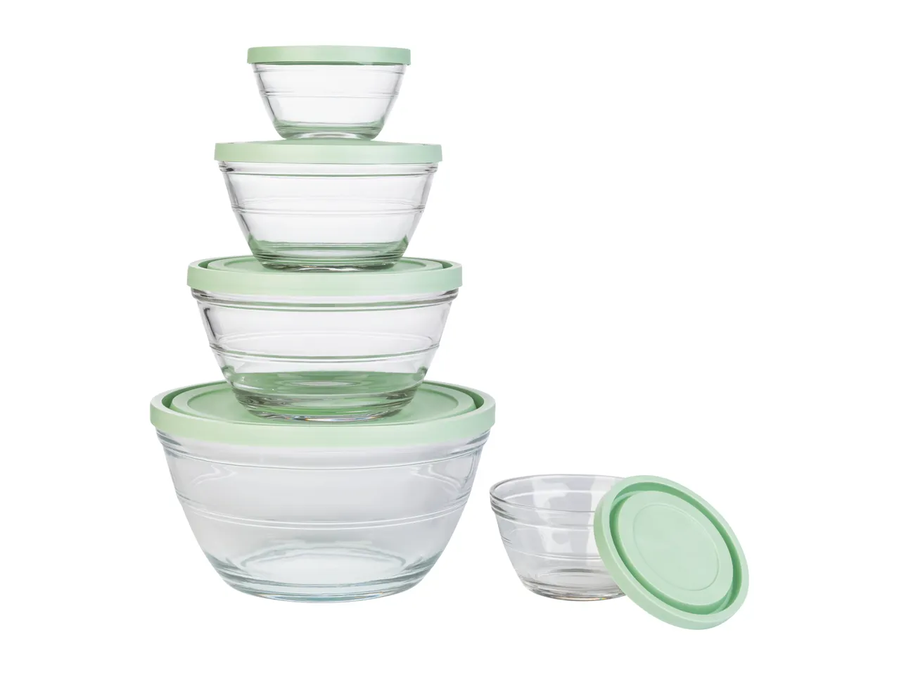 Set of five glass mixing bowls with light green lids.