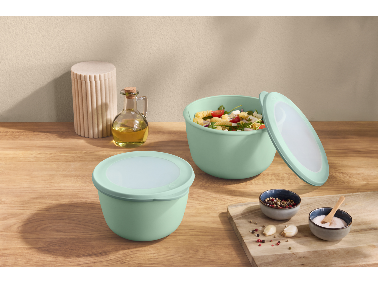 SILVERCREST® Food Container Set with pasta salad, olive oil, and spices on a wooden table.