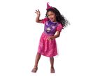 A young girl in a Paw Patrol Skye witch costume, with a pink dress and witch hat.