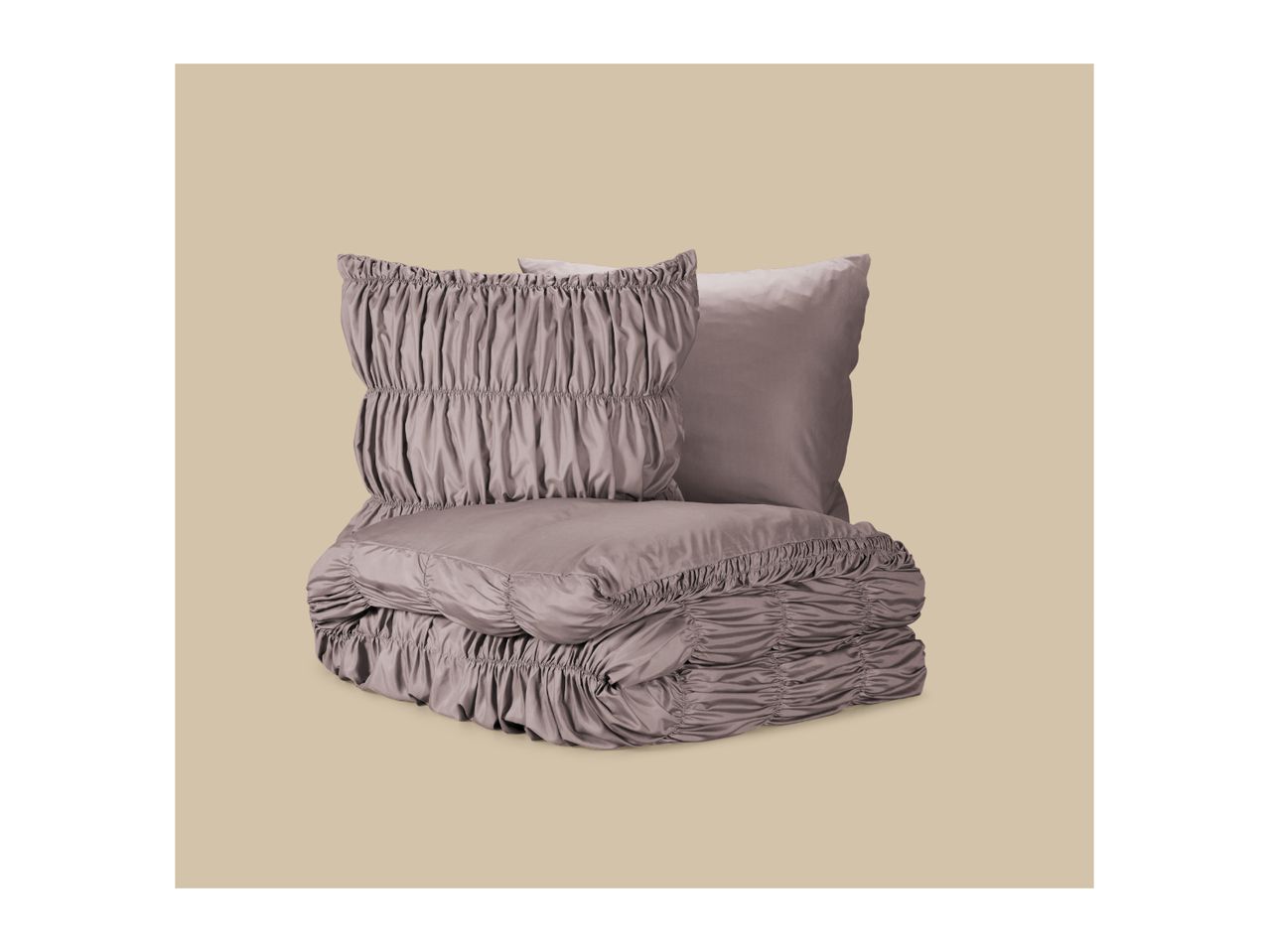 Ruched duvet cover and pillowcase set in a dusty purple color