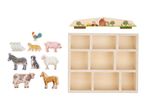Wooden farm animal figures and a wooden shelf with a farm-themed top panel.
