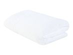 A folded white bath towel.