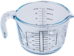Pyrex glazen maatbeker met markeringen voor liters, ounces en kopjes.