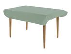 Rectangular table with a light green tablecloth and wooden legs.