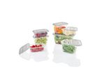 Clear food storage containers filled with fresh fruits and vegetables.