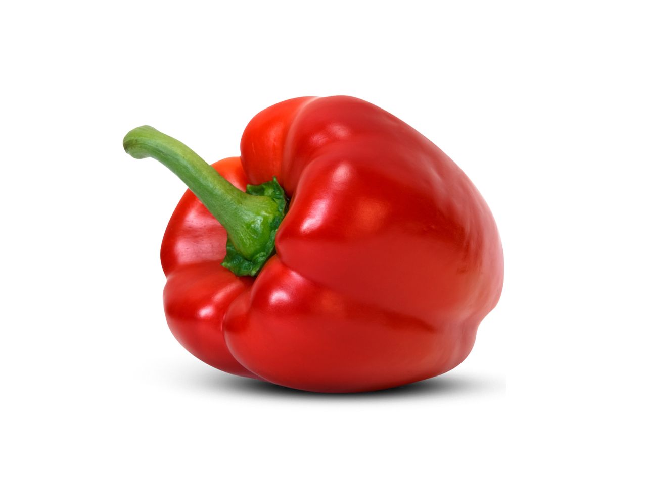 A vibrant red bell pepper with a green stem, isolated on a white background.