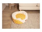 Cath Kidston bee-themed pet bed sits on a light beige rug in a living room.
