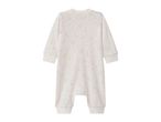 White baby sleepsuit with a pattern of small gold stars, back view.