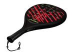 Black padel racket with red and green geometric patterns, featuring a wrist strap.