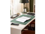 Crelando Planner on a green desk mat with a pen, phone, and desk lamp.