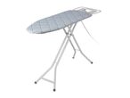 Ironing board with a blue geometric pattern cover and an iron rest