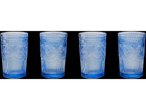 Four blue vintage-style decorated glasses.