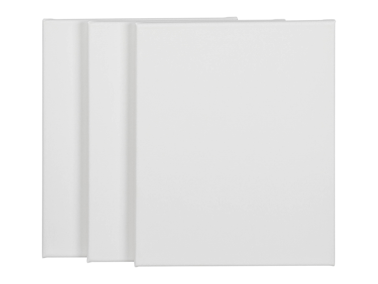 Three blank white stretched canvases stacked