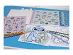 Stitch-themed stationery set with notebooks, coloring pages, and pencils on a blue background.