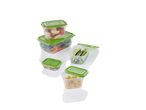 A set of stackable plastic food containers with green lids, filled with various snacks.
