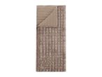 Taupe quilted velvet bedspread with a folded corner
