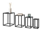 Set of four black metal nesting side tables in varying heights