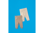 Two pairs of lupilu® baby joggers, one light beige and one brown, on a blue background.