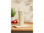 A SilverCrest pastel yellow thermos with a carrying handle sits on a wooden cutting board.