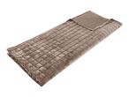Brown quilted weighted blanket folded on a white background