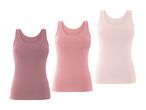 Tre bløde tanktops i forskellige rosa nuancer.