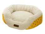 Cath Kidston's bee-themed pet bed features a cozy cream sherpa interior and a cheerful yellow exterior.