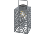 Siva LED solarna lampa sa izrezanim geometrijskim dizajnom i toplim svetlom.