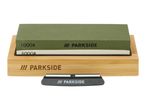 Dual-sided sharpening stone (1000/6000 grit) on a bamboo base with a sharpening guide.