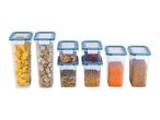 Set of transparent plastic food storage containers with blue lids, filled with various dry goods