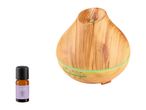 Wooden essential oil diffuser with a bottle of lavender oil.