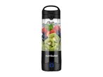 A black portable personal blender filled with fruit is ready to make a smoothie.