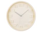 A cream-colored oval wall clock with raised numerals.