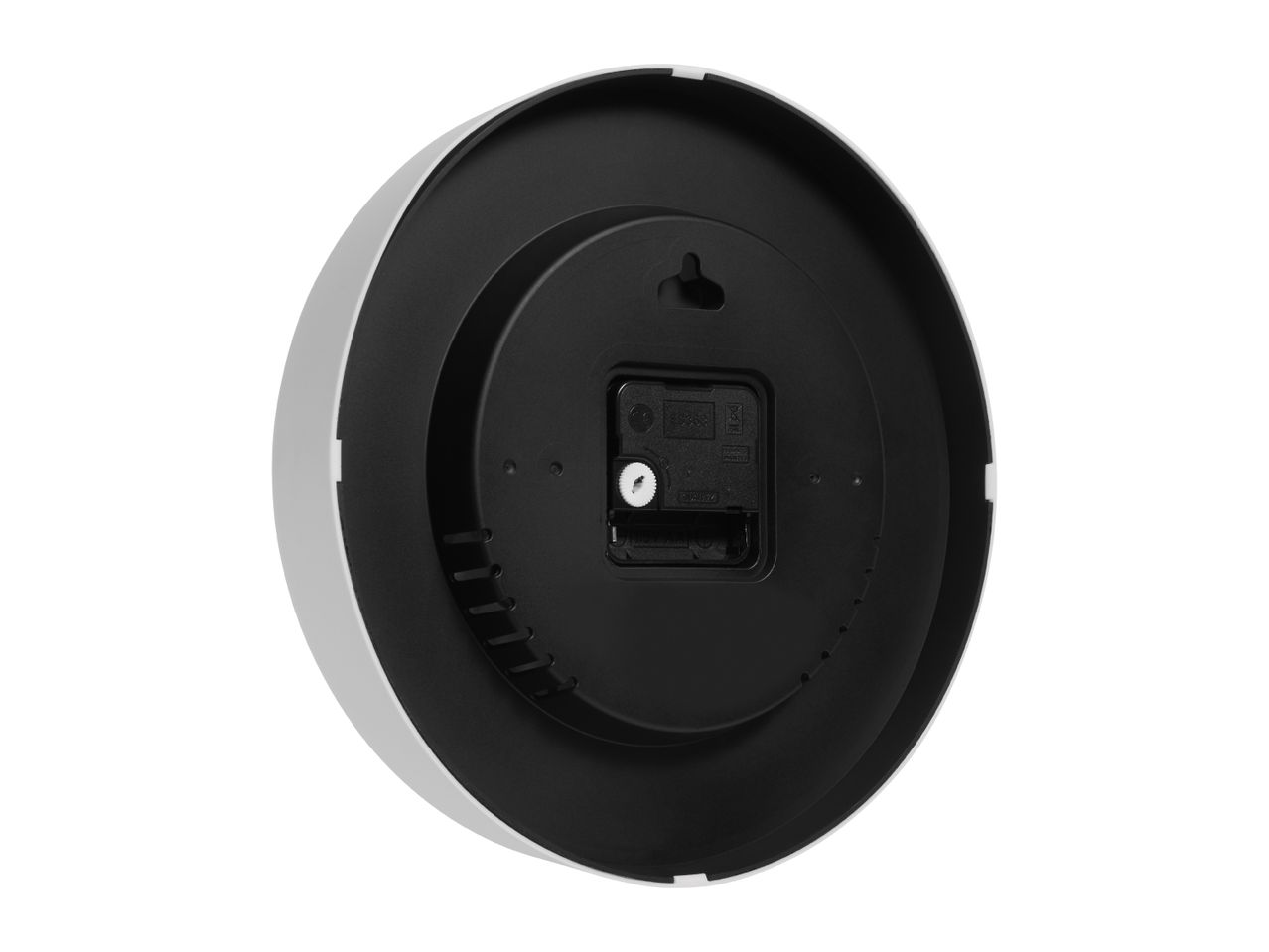 Rear view of a white and black wall clock with a quartz movement