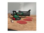 A Parkside wall and ceiling sander with accessories and a carrying bag on a wooden surface.