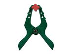 Green spring clamp with a red grip, isolated on a white background.