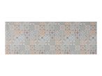Decorative floor tiles with various geometric and floral patterns in blue, grey, and orange.